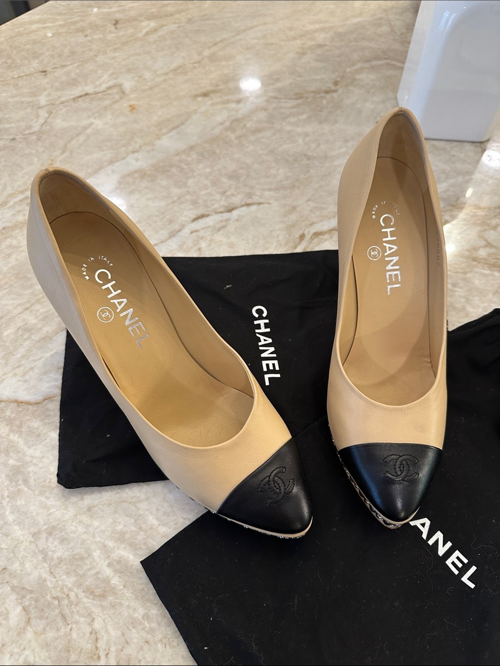 CHANEL Beige and Black Cap-Toe Heels